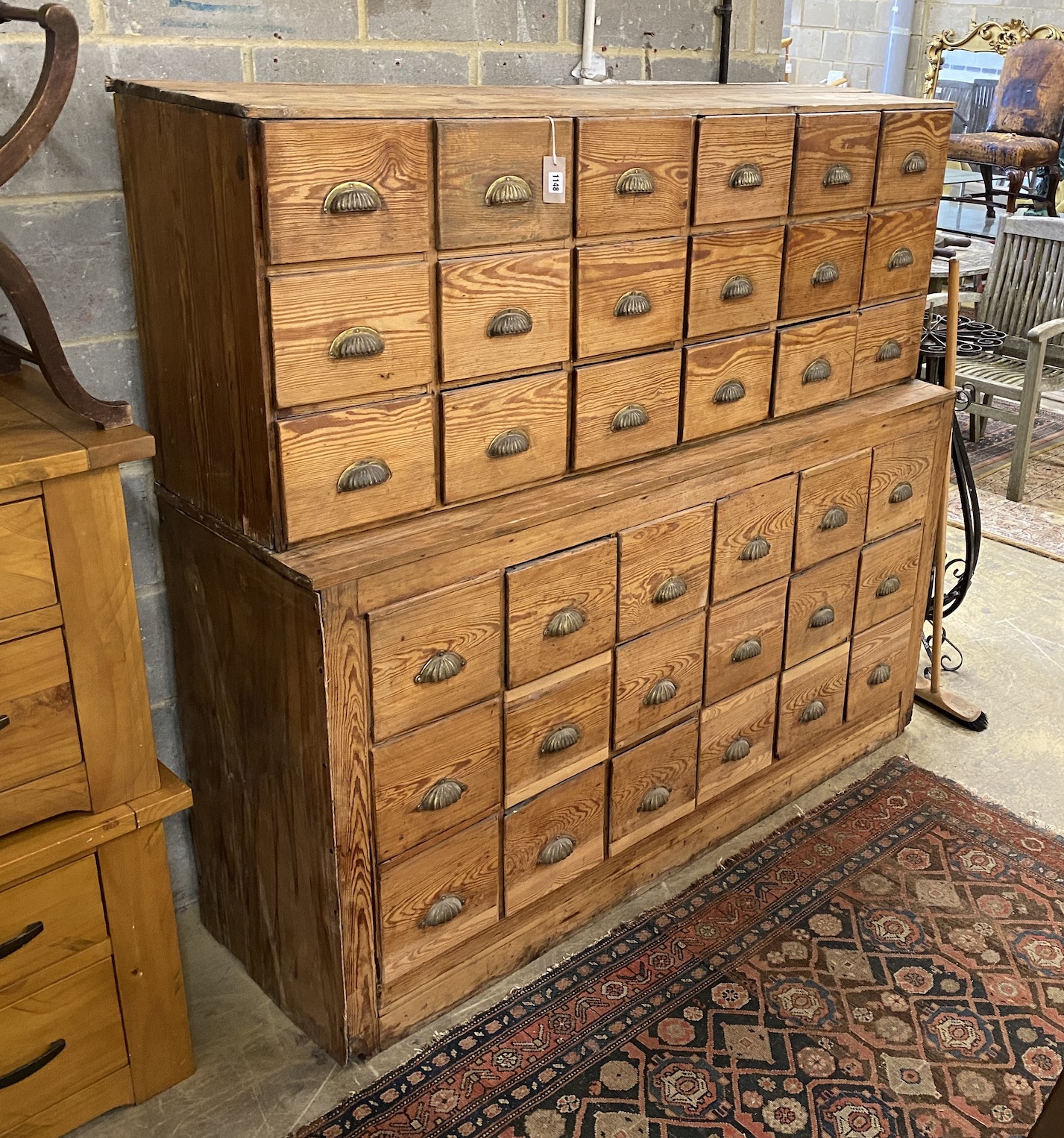 A Victorian pine two section bank of thirty six drawers, width 167cm, depth 50cm, height 153cm